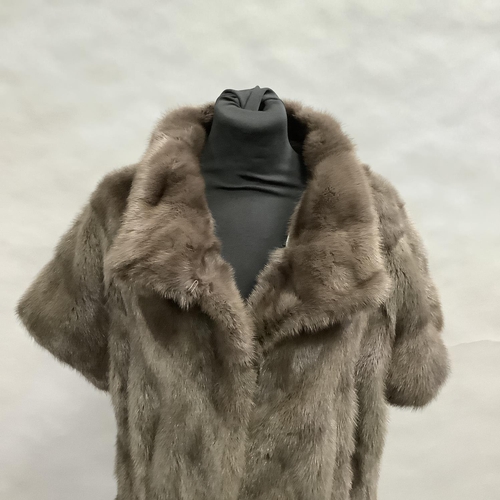 280 - A mink short-sleeved jacket or gilet in grey/brown mink, Size 8 approximately