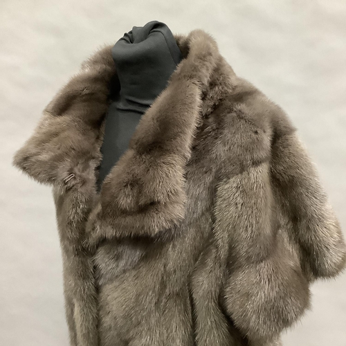 280 - A mink short-sleeved jacket or gilet in grey/brown mink, Size 8 approximately