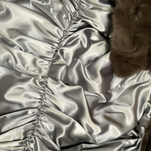 280 - A mink short-sleeved jacket or gilet in grey/brown mink, Size 8 approximately