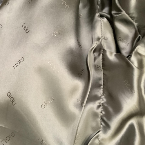 284 - An Italian dark brown/grey soft leather jacket, collarless edge-to-edge design with slit pockets, Si... 