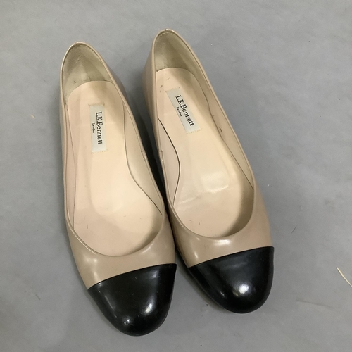 287 - A pair of Pretty Ballerinas pumps in ivory quilted leather with black patent toes, Size 38, a pair o... 