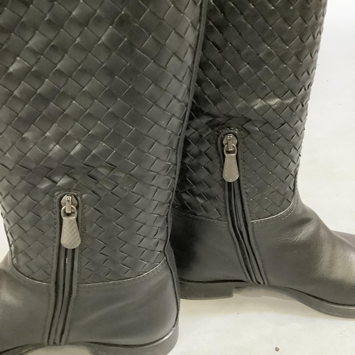 290 - A pair of Bottega Veneta lady's knee-high boots in black leather with woven intreccio detail, Size 3... 