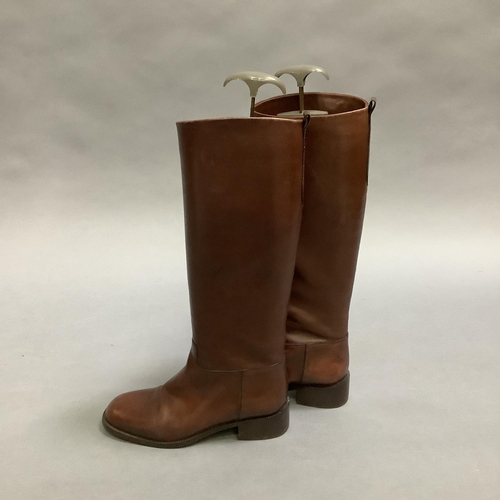292 - A pair of Etienne Aigner lady's knee high boots in dark brown leather, size shown 7½ (USA?) some mar... 