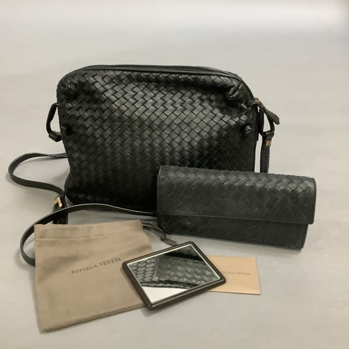 295 - A copy of Bottega Veneta black intrecciato leather cross body bag, 29cm wide approximately, in dust ... 