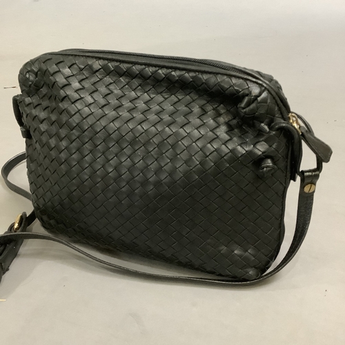 295 - A copy of Bottega Veneta black intrecciato leather cross body bag, 29cm wide approximately, in dust ... 