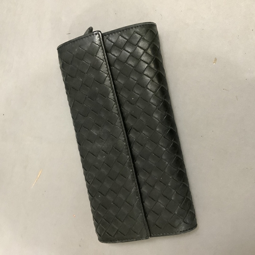 295 - A copy of Bottega Veneta black intrecciato leather cross body bag, 29cm wide approximately, in dust ... 