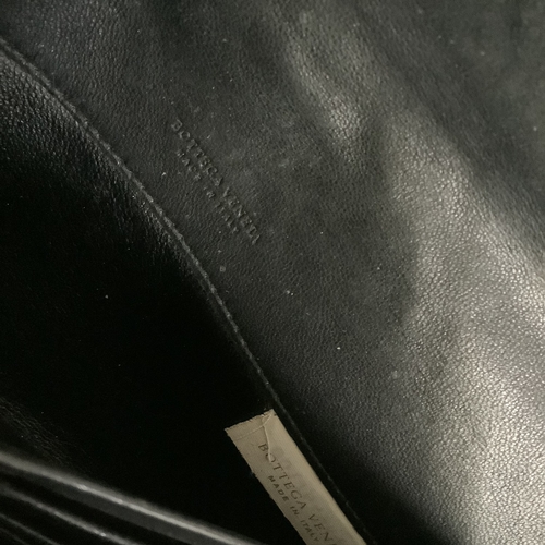 295 - A copy of Bottega Veneta black intrecciato leather cross body bag, 29cm wide approximately, in dust ... 