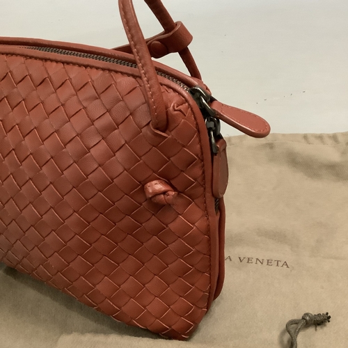 298 - A Bottega Veneta sapele intrecciato leather cross body bag, 26cm wide, with dust bag and matching mi... 