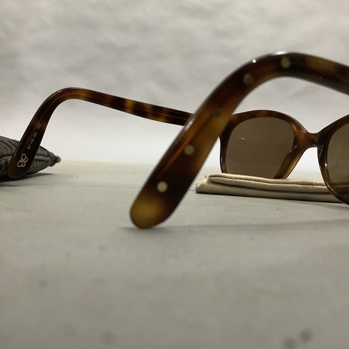 302 - A pair o  Bottega Veneta sun glasses in brown intrecciato leather case