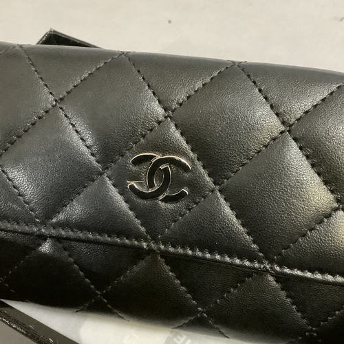 303 - A Chanel black leather card wallet in original box with authentication card No. 17364237 together wi... 