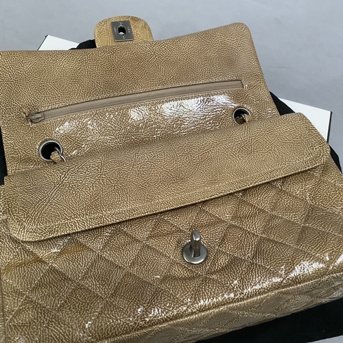305 - A Chanel caramel crinkled patent leather single flap bag with double-chain strap, 25cm wide, with au... 