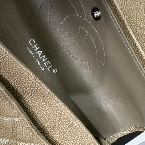 305 - A Chanel caramel crinkled patent leather single flap bag with double-chain strap, 25cm wide, with au... 