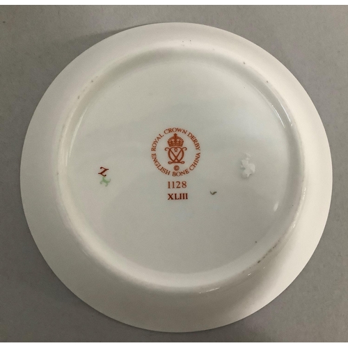 106 - A Royal Crown Derby pin dish pattern 1128, four various pin and trinket dishes by Minton Royal Worce... 