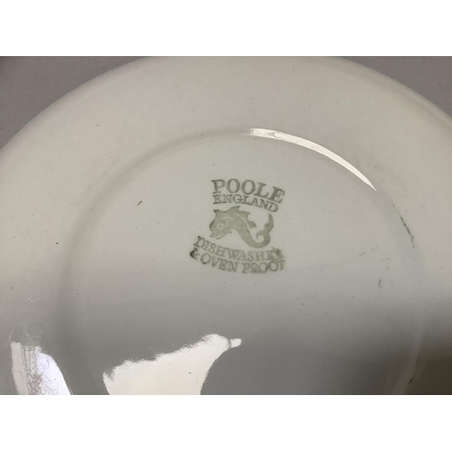 115 - A Poole two-tone cream and deep coral individual breakfast tea set of teapot, sugar, teacup and tray... 