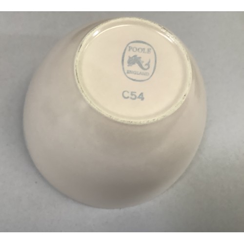 86 - A Poole pottery two-tone coffee ware including coffee pot, four coffee cups and five saucers, milk j... 