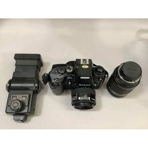 101 - A Nikon F4 camera with Nikkor 70mm lens, a Nikkor 70mm - 210mm zoom lens and a Vivitar zoom thyristo... 