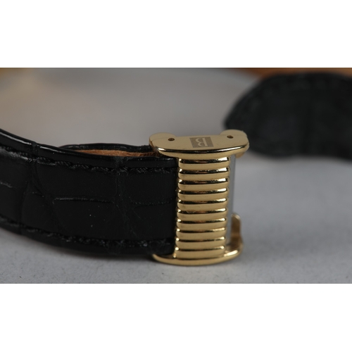 333 - A BOUCHERON LADY'S REFLET QUARTZ WRISTWATCH, in 18ct gold case no. AE12146, rectangular white cerami... 