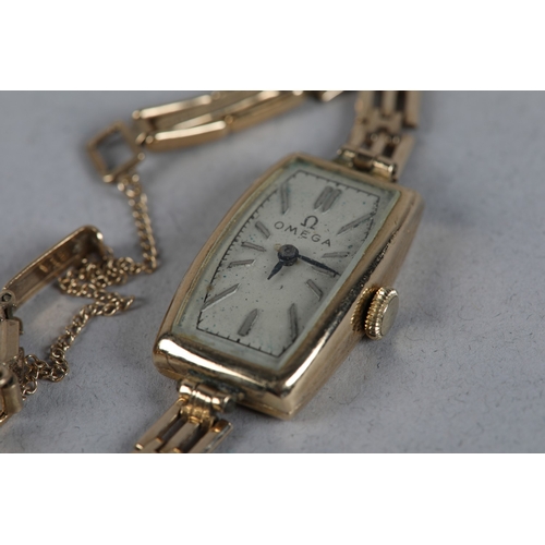 335 - AN OMEGA LADY'S MANUAL WRISTWATCH c1934 in rectangular 9ct gold case Number 65140 61707, 15 jewelled... 