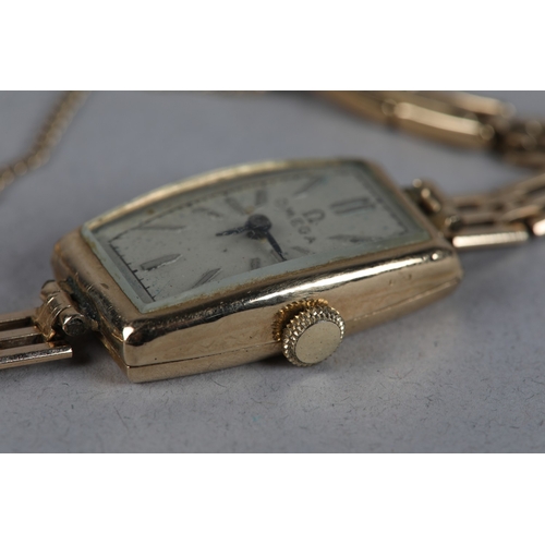 335 - AN OMEGA LADY'S MANUAL WRISTWATCH c1934 in rectangular 9ct gold case Number 65140 61707, 15 jewelled... 