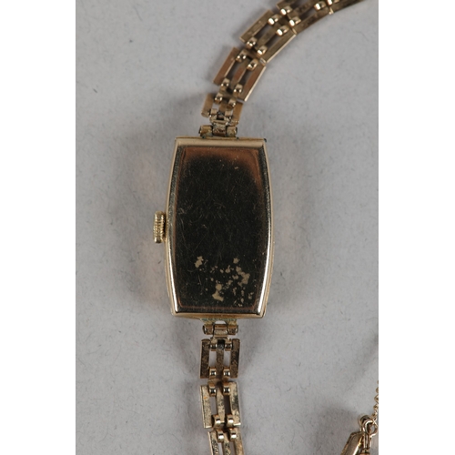 335 - AN OMEGA LADY'S MANUAL WRISTWATCH c1934 in rectangular 9ct gold case Number 65140 61707, 15 jewelled... 