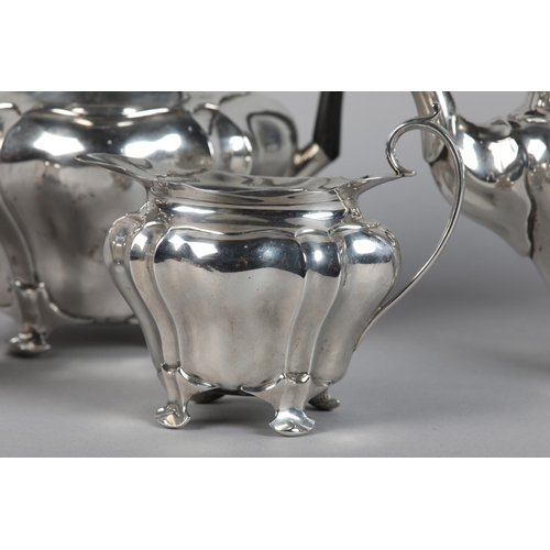 222 - AN EDWARD VII FOUR PIECE SILVER TEA SET, Chester 1906-1907 for Walker and Hall, pattern number 53478... 