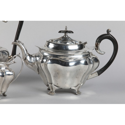 222 - AN EDWARD VII FOUR PIECE SILVER TEA SET, Chester 1906-1907 for Walker and Hall, pattern number 53478... 