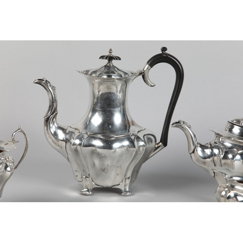 222 - AN EDWARD VII FOUR PIECE SILVER TEA SET, Chester 1906-1907 for Walker and Hall, pattern number 53478... 