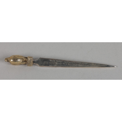 221 - AN ELIZABETH II SILVER PAPERKNIFE, Sheffield 1986, for Roberts & Belk, the handle cast as a silver g... 