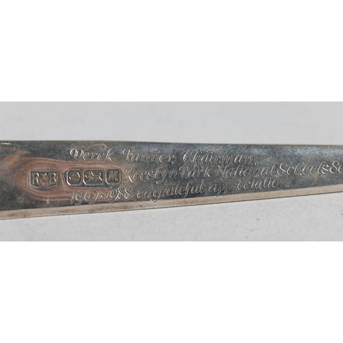 221 - AN ELIZABETH II SILVER PAPERKNIFE, Sheffield 1986, for Roberts & Belk, the handle cast as a silver g... 