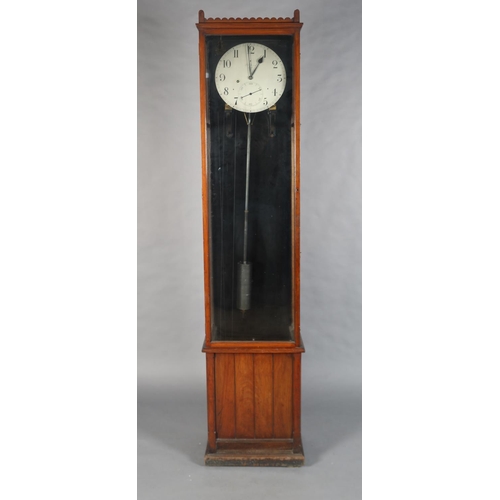 69 - AN EARLY 20TH CENTURY WALNUT AND GLAZED REGULATOR, signed F. C. Moore of Leeds, having a silvered di...