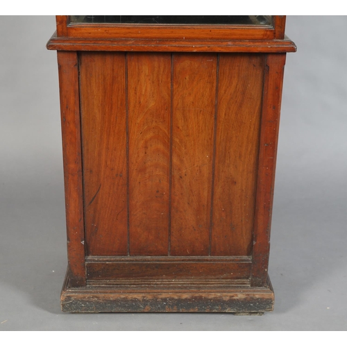 69 - AN EARLY 20TH CENTURY WALNUT AND GLAZED REGULATOR, signed F. C. Moore of Leeds, having a silvered di... 