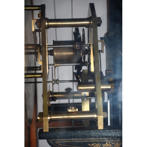 69 - AN EARLY 20TH CENTURY WALNUT AND GLAZED REGULATOR, signed F. C. Moore of Leeds, having a silvered di... 