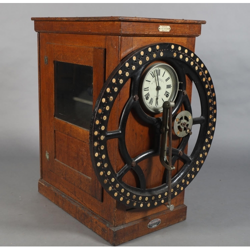 70 - A BRITISH TIME RECORDER CO LTD FACTORY CLOCKING-IN MACHINE with numbered wheel and pointer, the 8-da... 