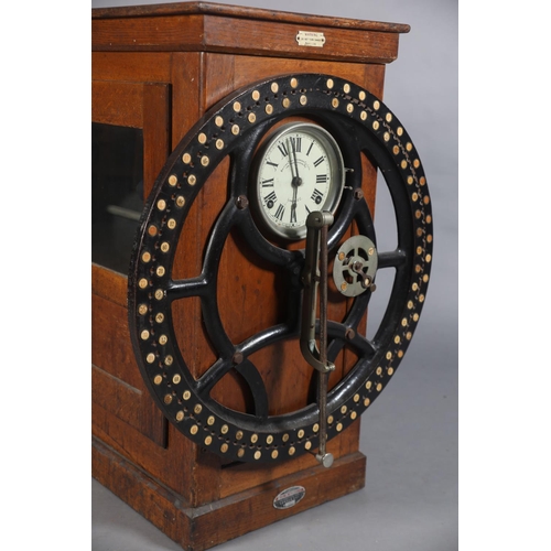 70 - A BRITISH TIME RECORDER CO LTD FACTORY CLOCKING-IN MACHINE with numbered wheel and pointer, the 8-da... 