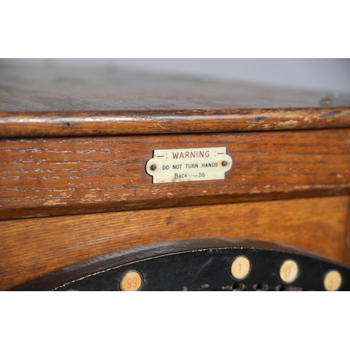 70 - A BRITISH TIME RECORDER CO LTD FACTORY CLOCKING-IN MACHINE with numbered wheel and pointer, the 8-da... 