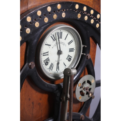 70 - A BRITISH TIME RECORDER CO LTD FACTORY CLOCKING-IN MACHINE with numbered wheel and pointer, the 8-da... 