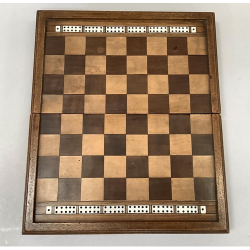 30 - AN EARLY 20TH CENTURY WALNUT AND PEARWOOD GAMES BOX, the exterior with chequered board, inlaid with ... 