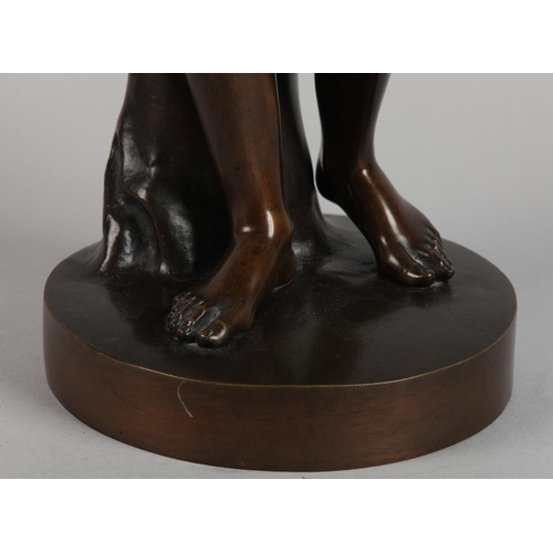 76 - A PATINATED BRONZE FIGURE OF ANTINOUS, standing on a circular base, after the antique, foundry stamp... 