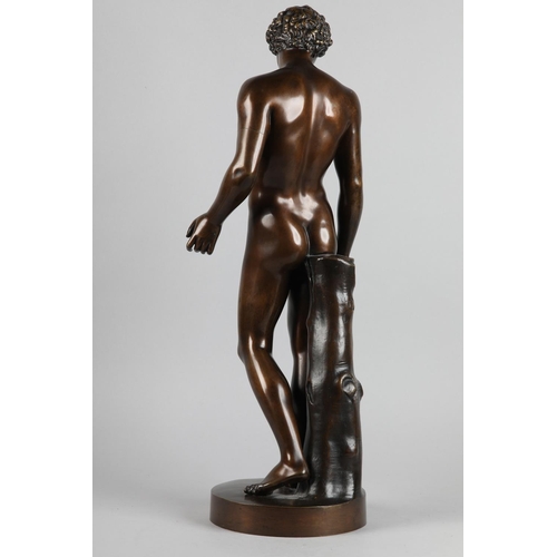 76 - A PATINATED BRONZE FIGURE OF ANTINOUS, standing on a circular base, after the antique, foundry stamp... 