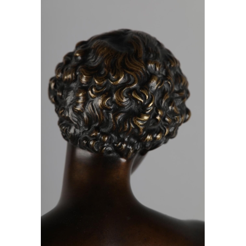 76 - A PATINATED BRONZE FIGURE OF ANTINOUS, standing on a circular base, after the antique, foundry stamp... 