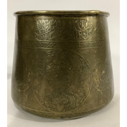 20 - AN ISLAMIC BRASS VESSEL, 14.5cm diameter x 13.5cm high, an Eastern lacquered beggar's bowl and a cop... 