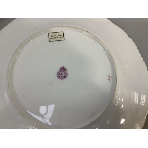 91 - A ROYAL WORCESTER CABINET PLATE, painted to the centre with a lake and mountain landscape by Harry D... 