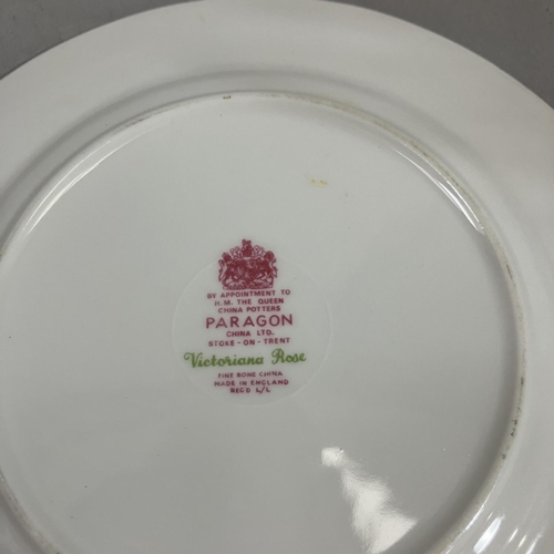 20 - A Paragon china tea and coffee service of Victoriana Rose design comprising twelve dinner plates, tw... 
