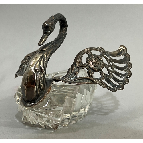 12 - A silver mounted and cut glass bon bon dish in the form of a swan, .925 import mark, 9.5cm high