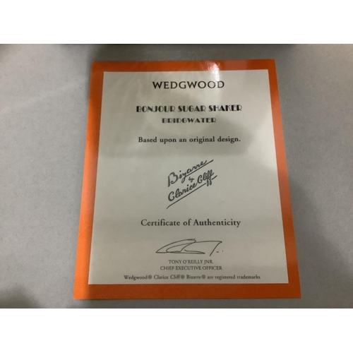 4B - A Wedgwood Bizarre by Clarice Cliff Bonjour sugar shaker of Bridgewater pattern, with original packa... 