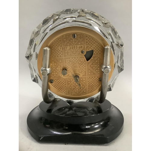 7 - An Art Deco mantel clock by MASK having a coppered circular dial with white metal Arabic numerals wi... 