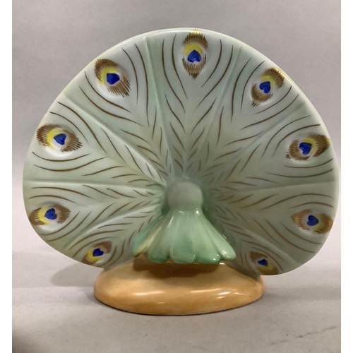 52 - A Herend porcelain figure of a peacock, 12cm high