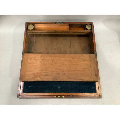 A 19th century mahogany and brass bound writing box, the interior ...