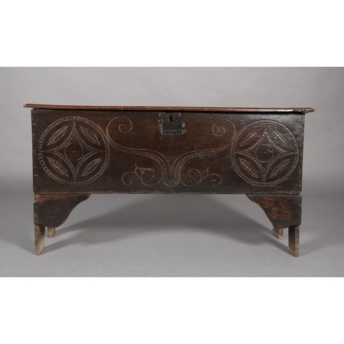 273 - A LATE 17TH CENTURY OAK JOINED CHEST, having a twin plank top with moulded and lined rim, the front ... 
