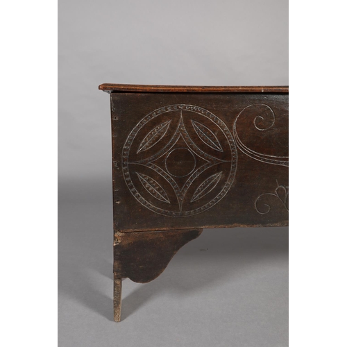 273 - A LATE 17TH CENTURY OAK JOINED CHEST, having a twin plank top with moulded and lined rim, the front ... 